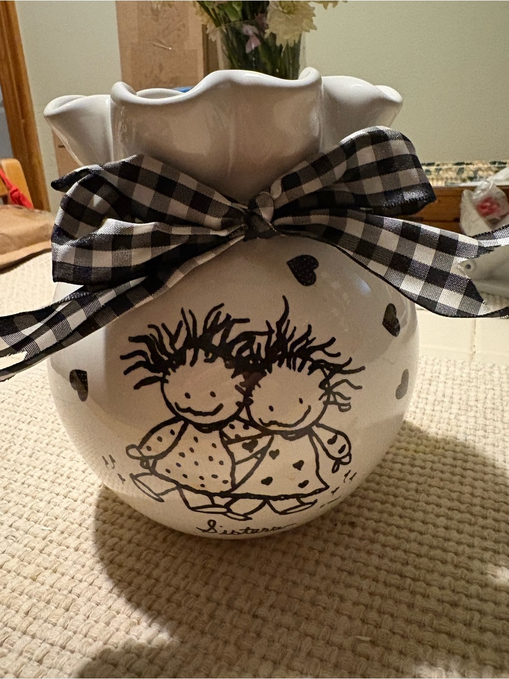 White Ceramic Vase with Black Sketch Girls and Gingham Bow